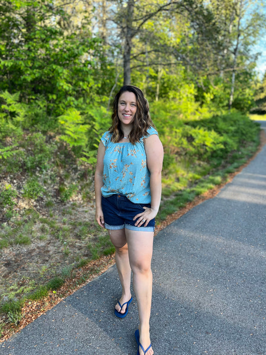 Light Blue Floral Top in sizes small through XL. 