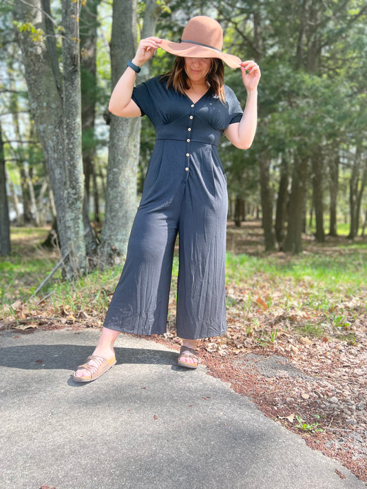 Black short sleeve with decorative buttons and 3/4 length pants jumper