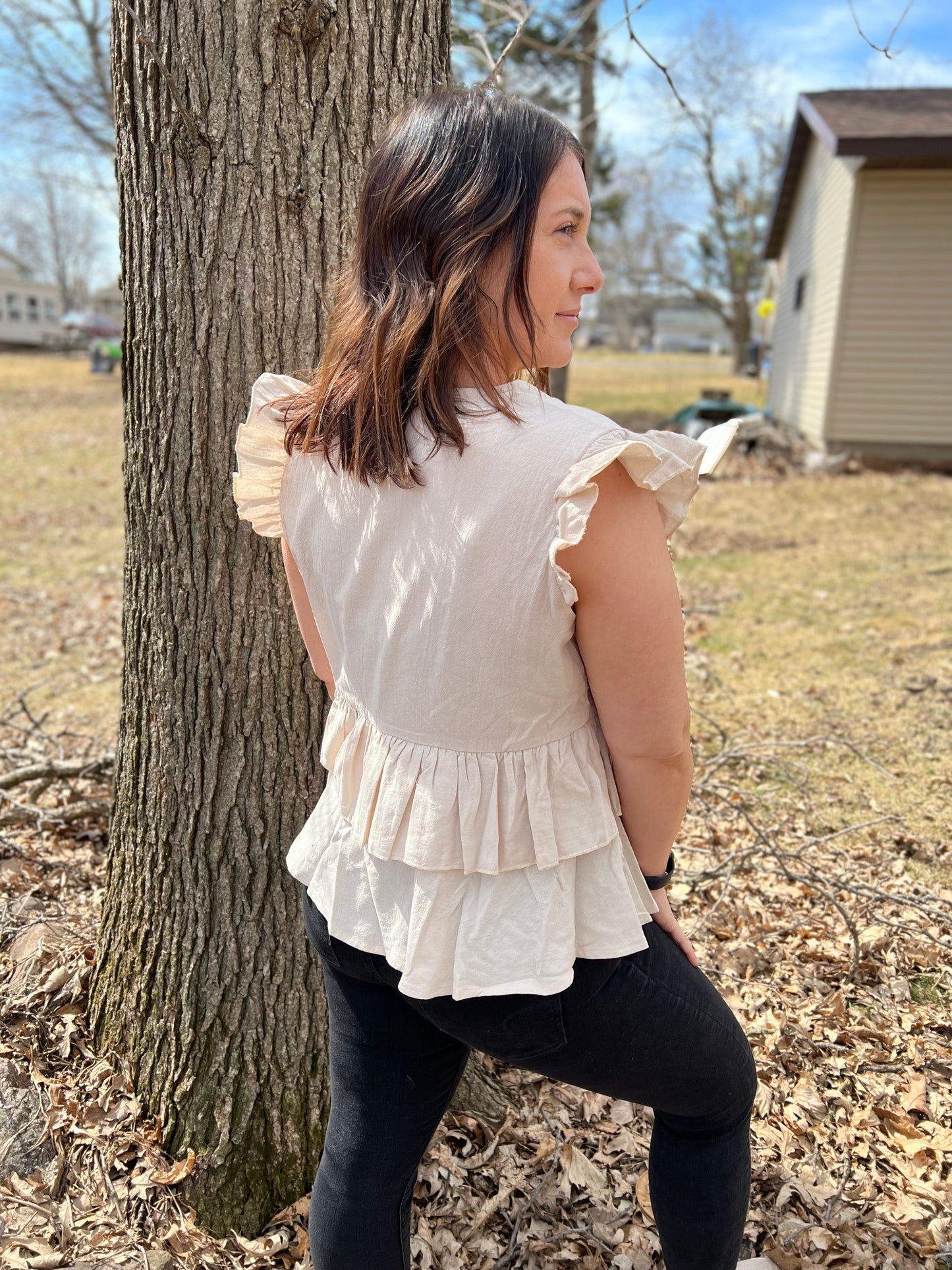 Beige button-up blouse with ruffle sleeves 