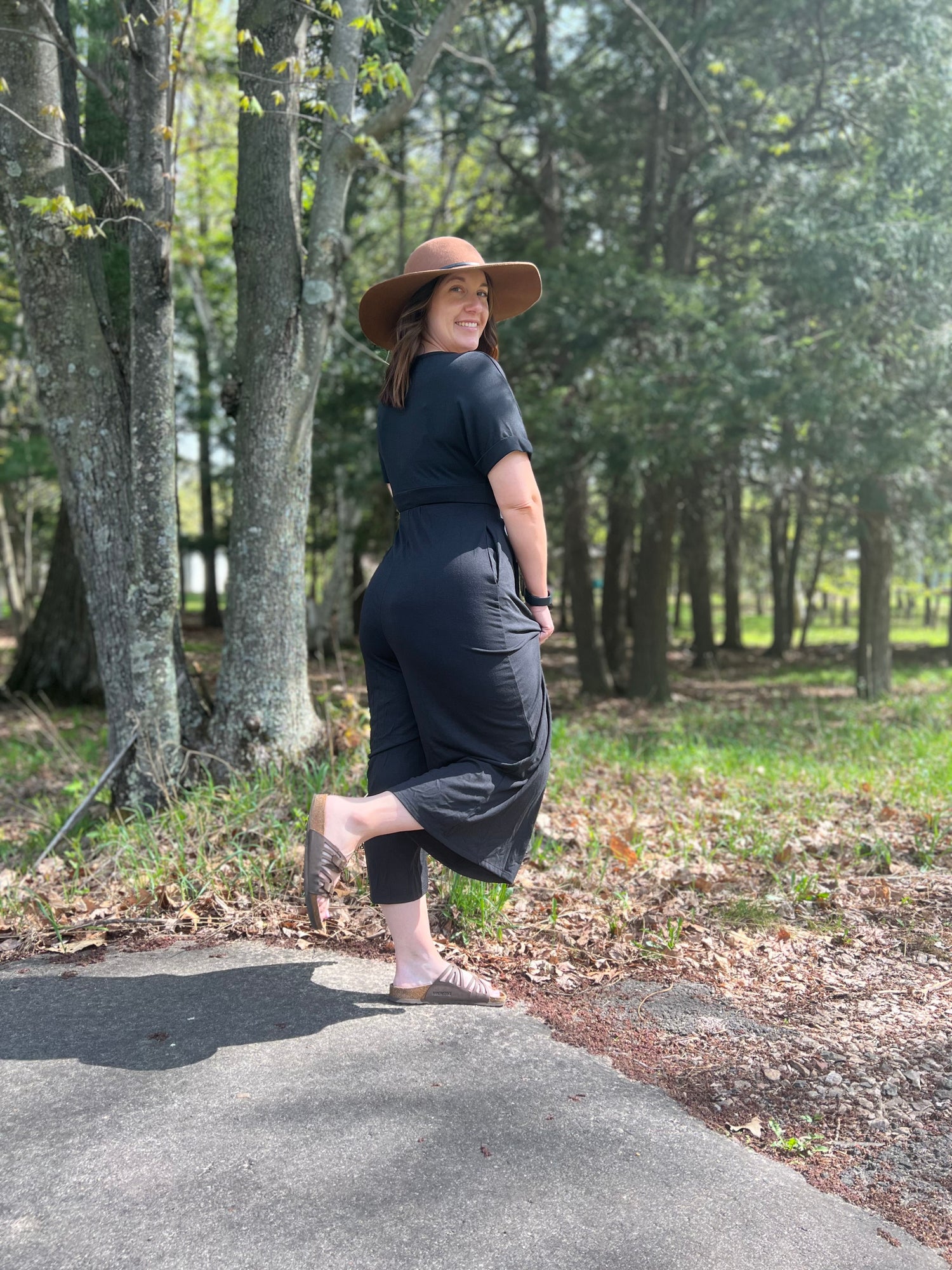 Black short sleeve with decorative buttons and 3/4 length pants jumper